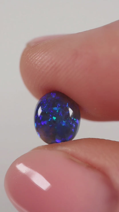 1.23ct Black Opal - 6.7 x 7.8 x 4.10mm