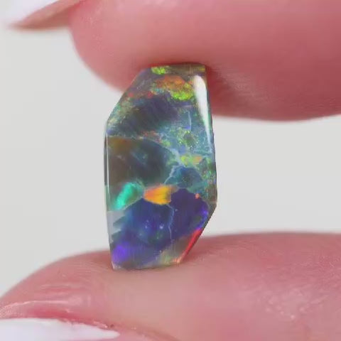1.26ct Black Opal - 5.5 x 9.5 x 3mm