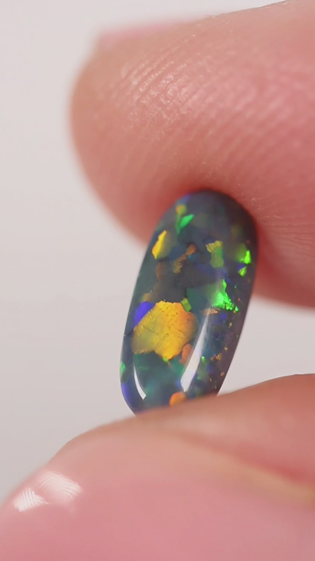 0.82ct Black Opal - 10 x 4.5 x 3mm