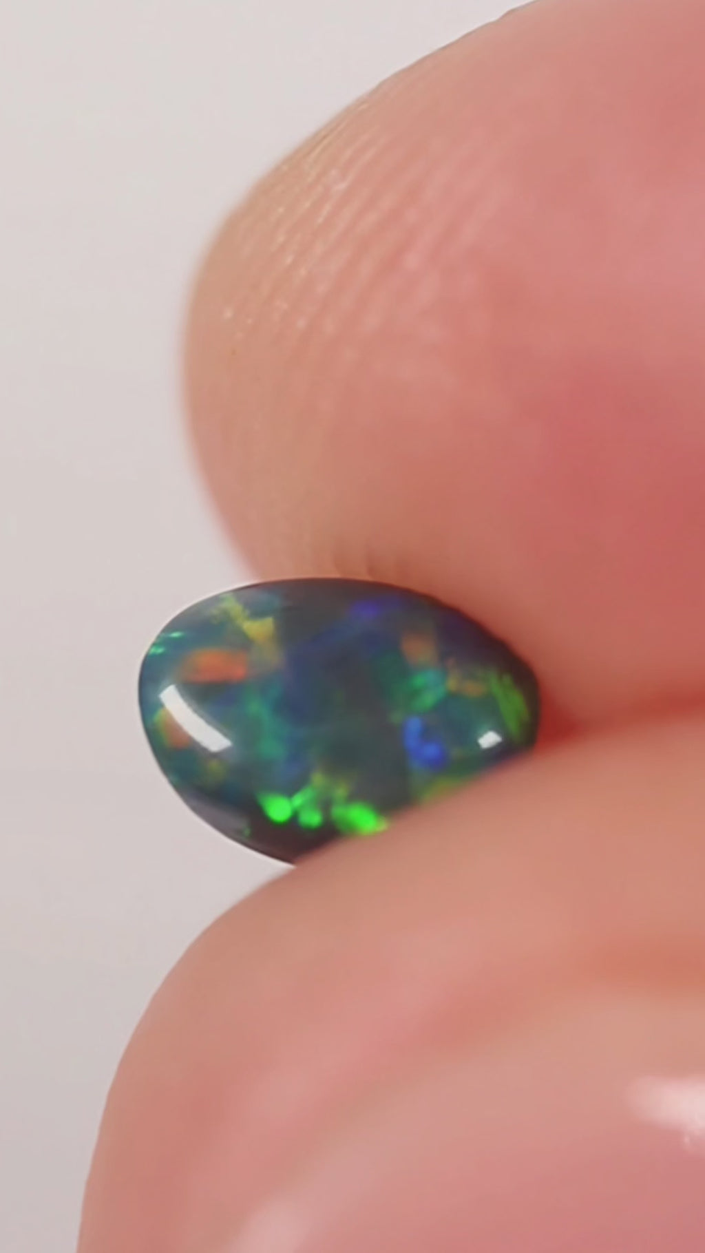 0.32ct Black Opal - 3.7 x 4.9 x 2.8mm