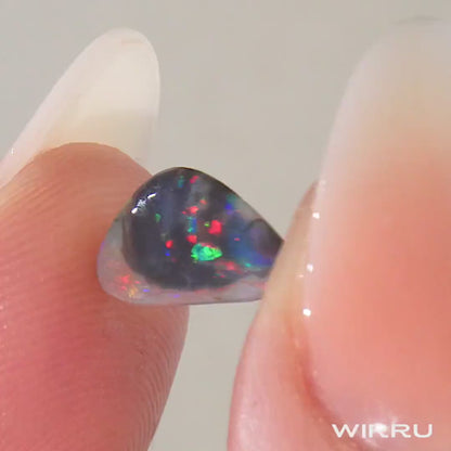 0.74ct Black Opal - 6.5 x 11 x 2mm