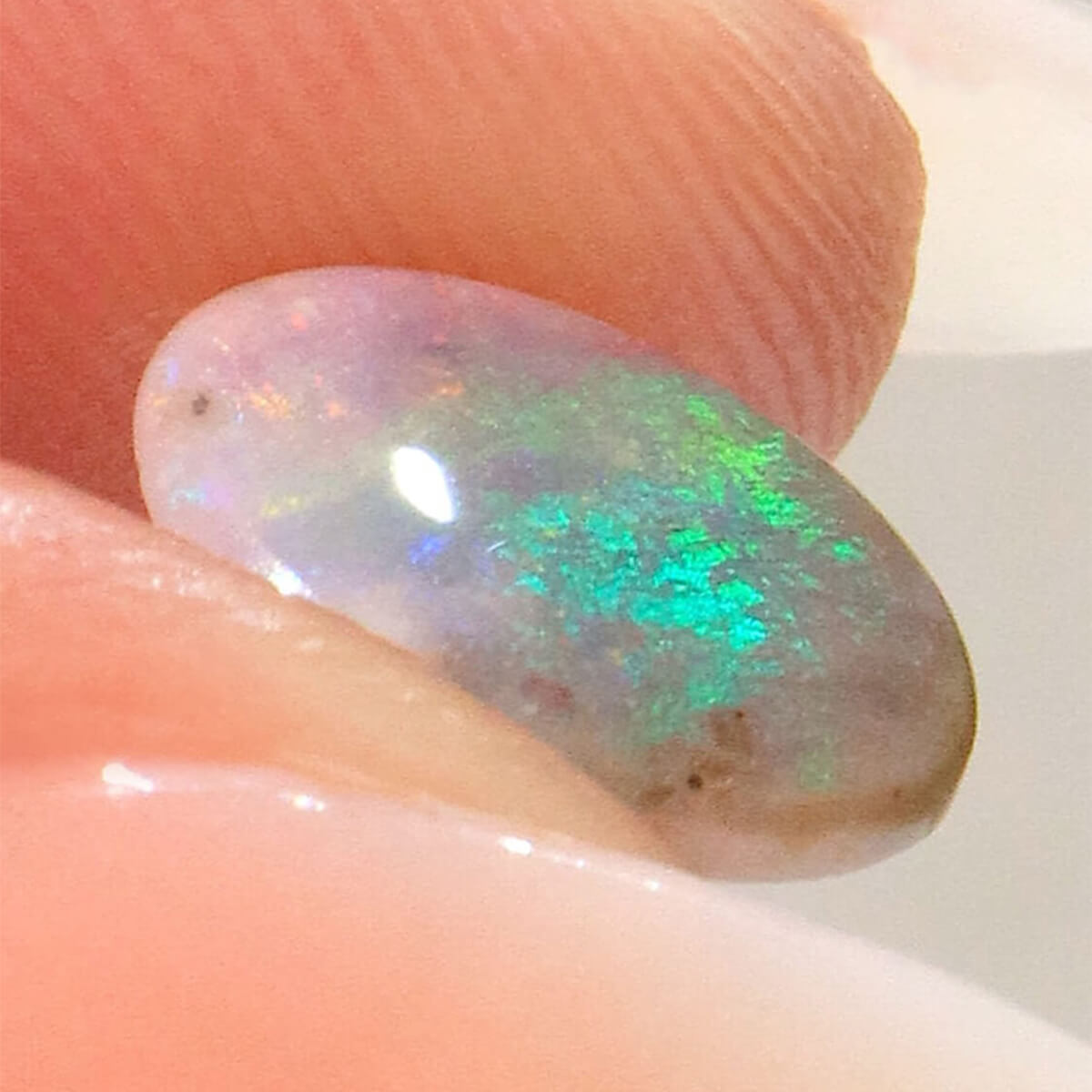 0.86ct Dark Opal - 7.5 x 10 x 2mm