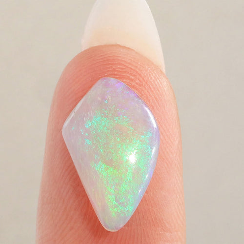Close detail of moss pattern on dark crystal opal